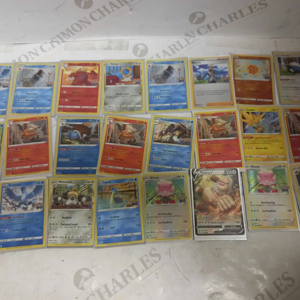 LOT OF 24 ASSORTED POKEMON CARDS