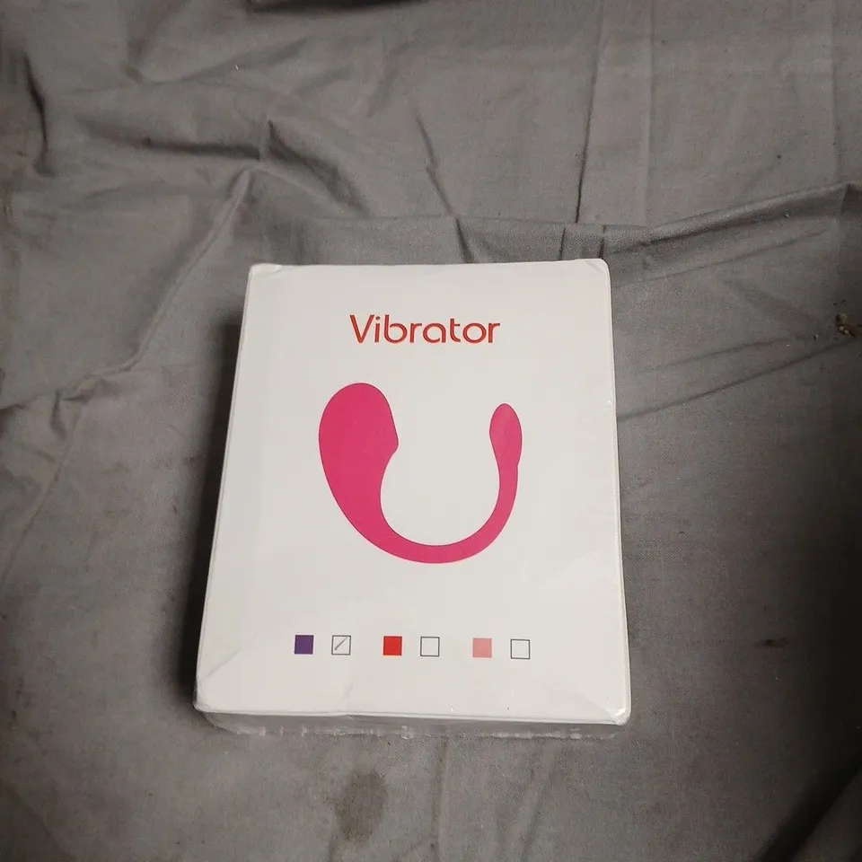 VIBRATOR – BOXED, WHITE BOX WITH PINK U-SHAPED GRAPHIC