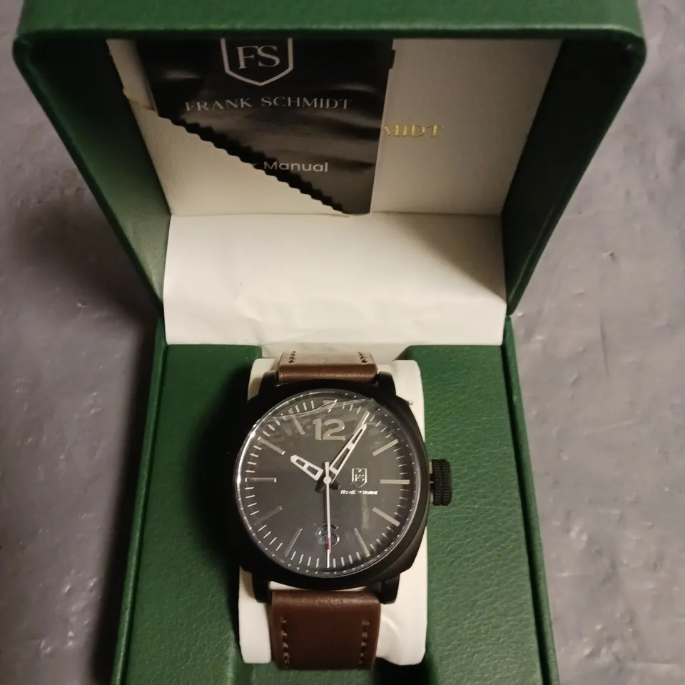 FRANK SCHMIDT BLACK DIAL AND CASE GENTS WATCH WITH STAINLESS STEEL BACK AND BROWN RUBBER STRAP IN BOX