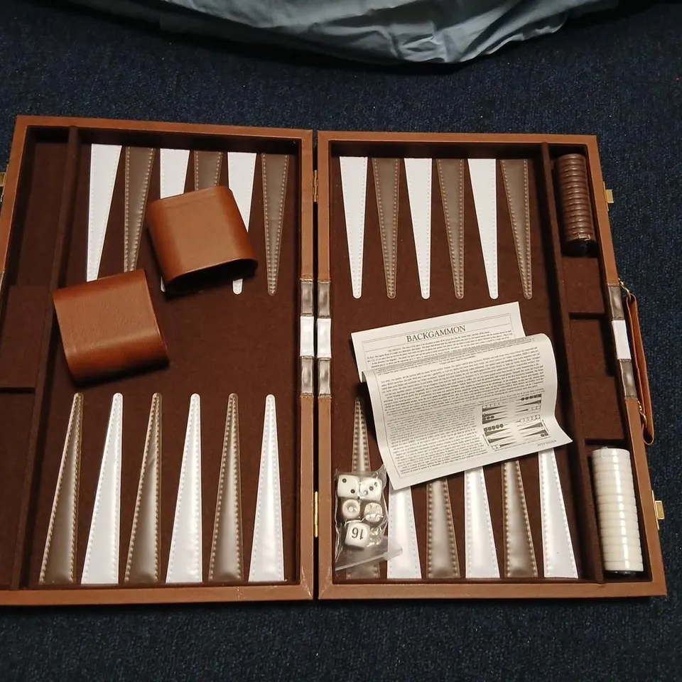 BACKGAMMON SET IN BROWN LEATHER CASE WITH DICE CUPS AND INSTRUCTION SHEET