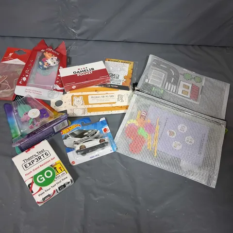 TOTE OF ASSORTED TOYS AND ACCESSORIES TO INCLUDE; LIVERPOOL AIR FRESHENER, GAMELIB POCKET AND THEORY TEST EXPERT 