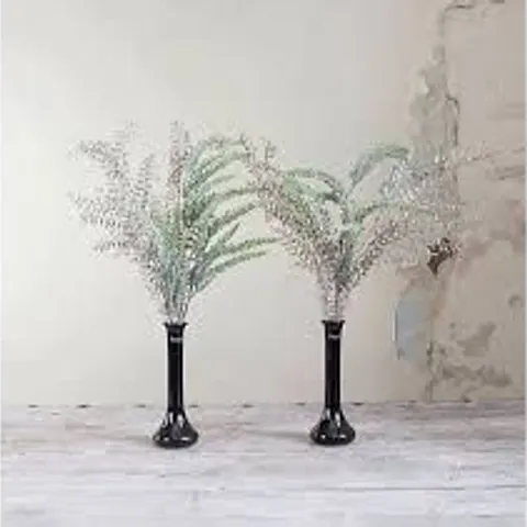 PEONY SPARKLE FOILAGE IN A LARGE BLACK FOOTED VASE