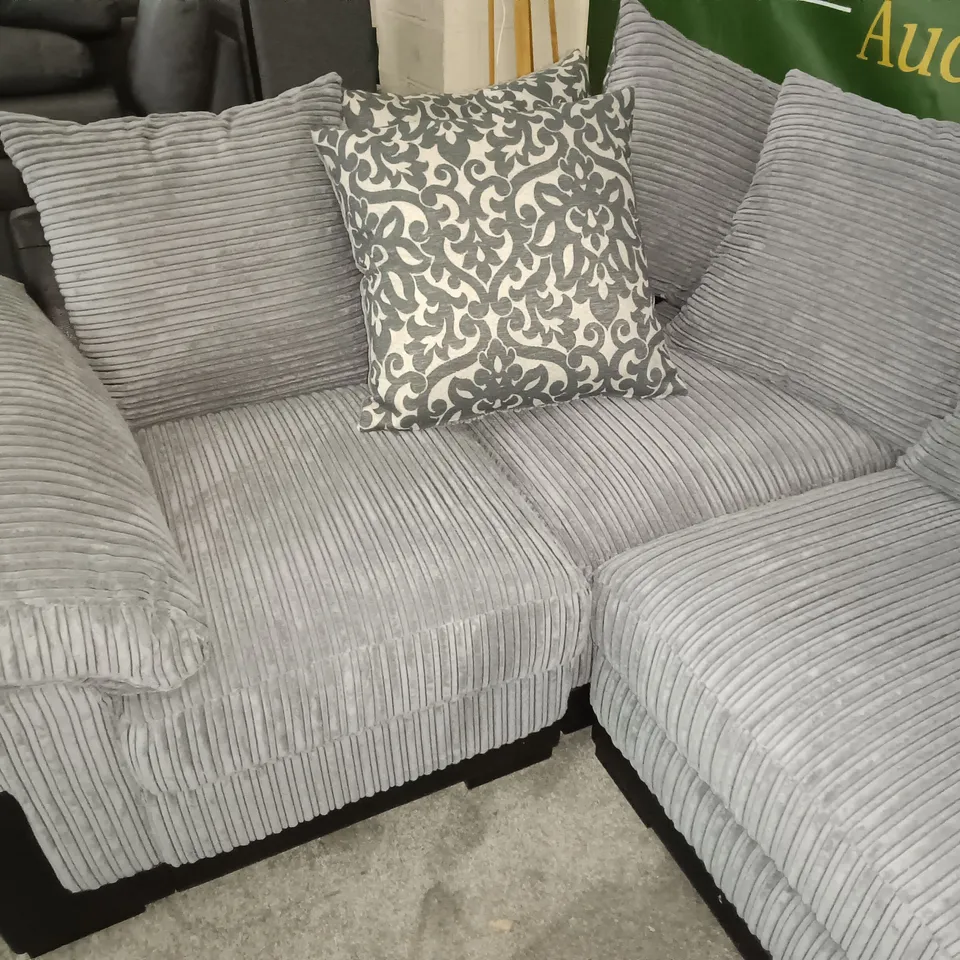 TWO-TONE GREY JUMBO CORD AND BLACK FAUX LEATHER CORNER SOFA