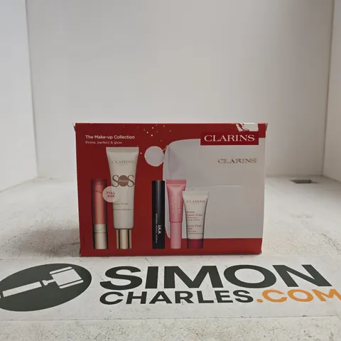 CLARINS THE MAKE-UP COLLECTION – COSMETIC KIT WITH WHITE POUCH