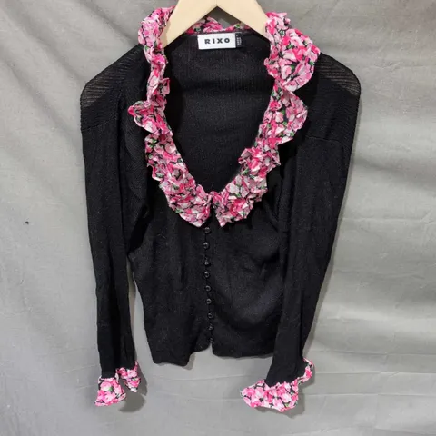 RIXO BLACK KNIT CARDIGAN WITH PINK FLORAL RUFFLE COLLAR & CUFFS – UK 14 (EU 42, US 10)