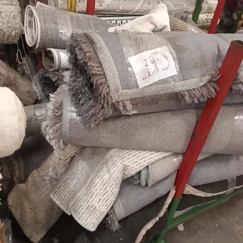 STILLAGE OF ASSORTED QUALITY RUGS APPROXIMATELY 18