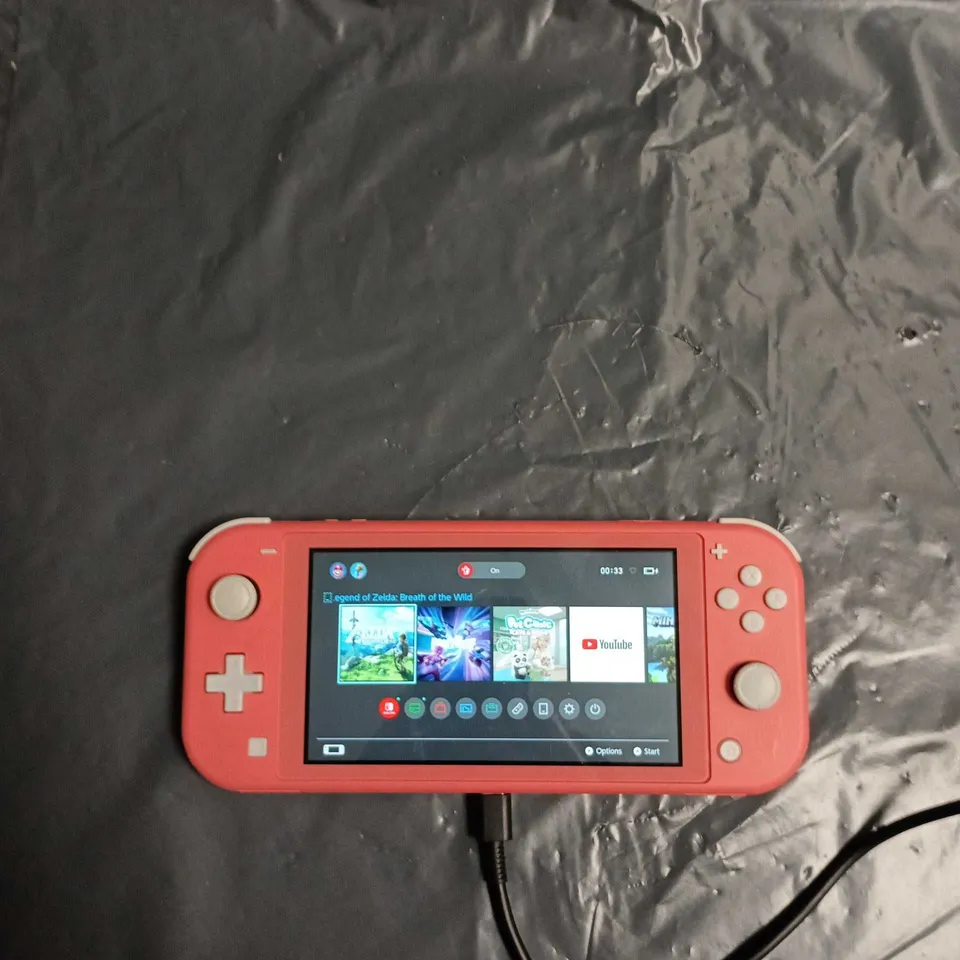 NINTENDO SWITCH LITE CORAL PINK 