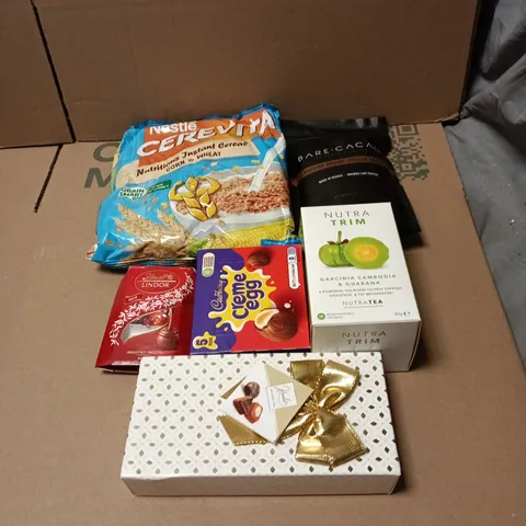 TOTE OF APPROXIMATELY 15 ASSORTED FOOD/DRINK ITEMS TO INCLUDE NESTLE CEREVITA, BARE CACAO, LINDOR, CREME EGG, NUTRA TRIM, HAMLET BELGIUM CHOCOLATE ETC