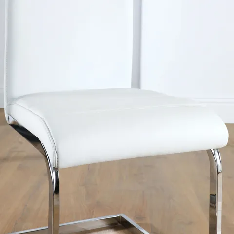 BOXED CELESTE DINING CHAIR, WHITE PREMIUM FAUX LEATHER & CHROME 