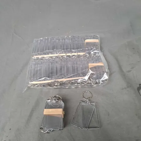 BOX OF APPROX 200 CLEAR PLASTIC PHOTO KEYRINGS