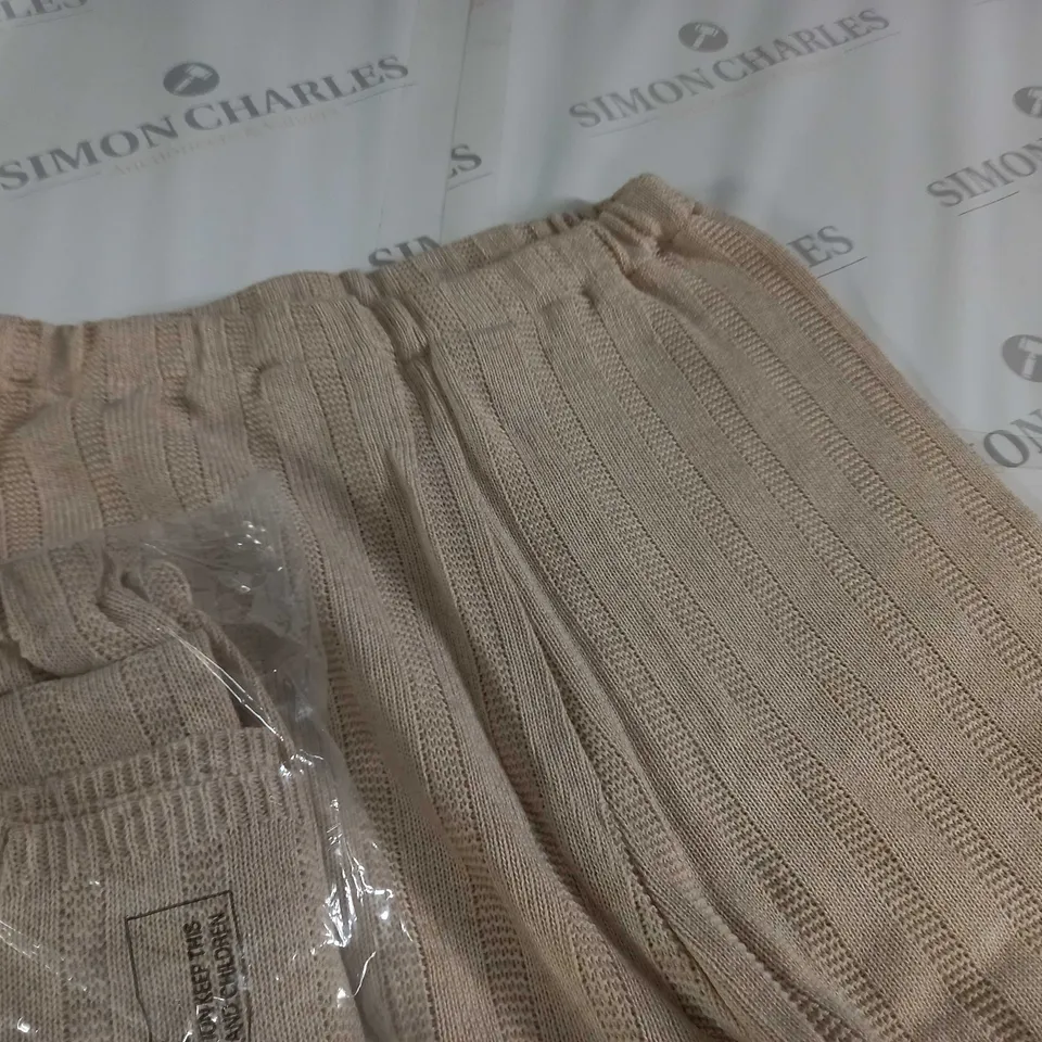LOT OF 10 KNITTED LEGGINGS IN BEIGE - SIZE UNSPECIFIED