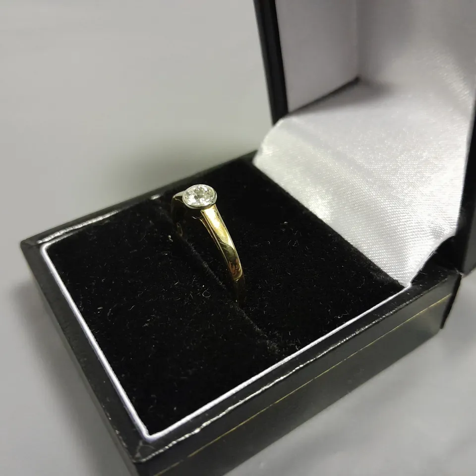 14CT GOLD SOLITAIRE RING RUB-OVER SET WITH NATURAL DIAMOND
