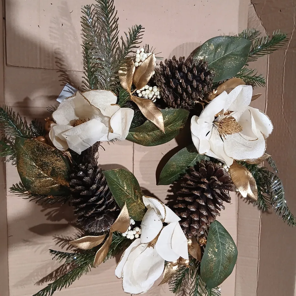 TWO GISELA GRAHAM LONDON DECORATIVE CHRISTMAS WREATH WITH PINECONES, WHITE FLOWERS AND GOLD-TONED FOLIAGE