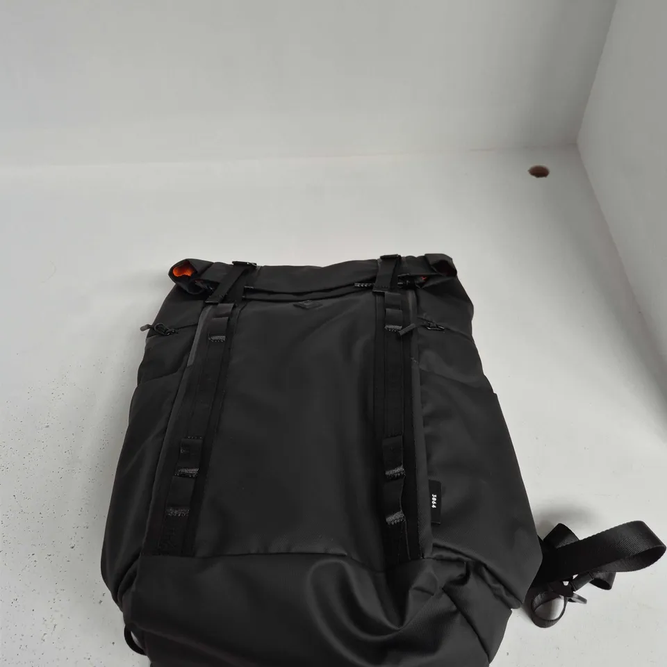 BLACK RUCKSACK WITH MULTIPLE EXTERIOR STRAPS – TAG 3064 