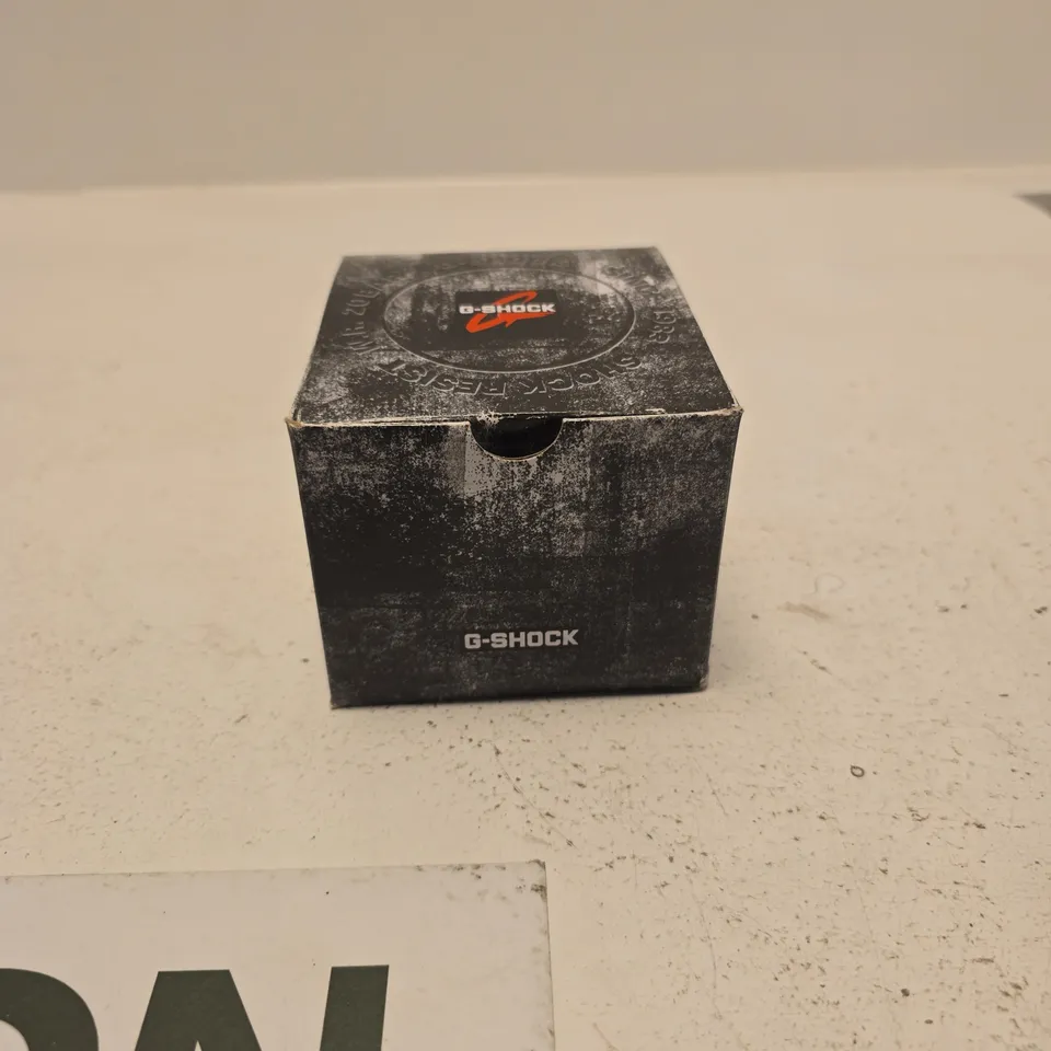CASIO G-SHOCK DIGITAL WATCH WITH HEXAGONAL TIN BOX