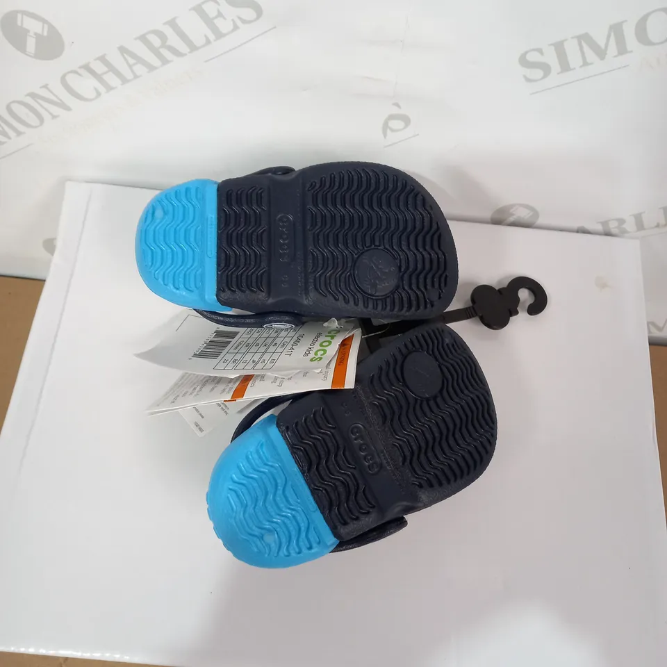 BOXED PAIR OF CROCS SIZE C5