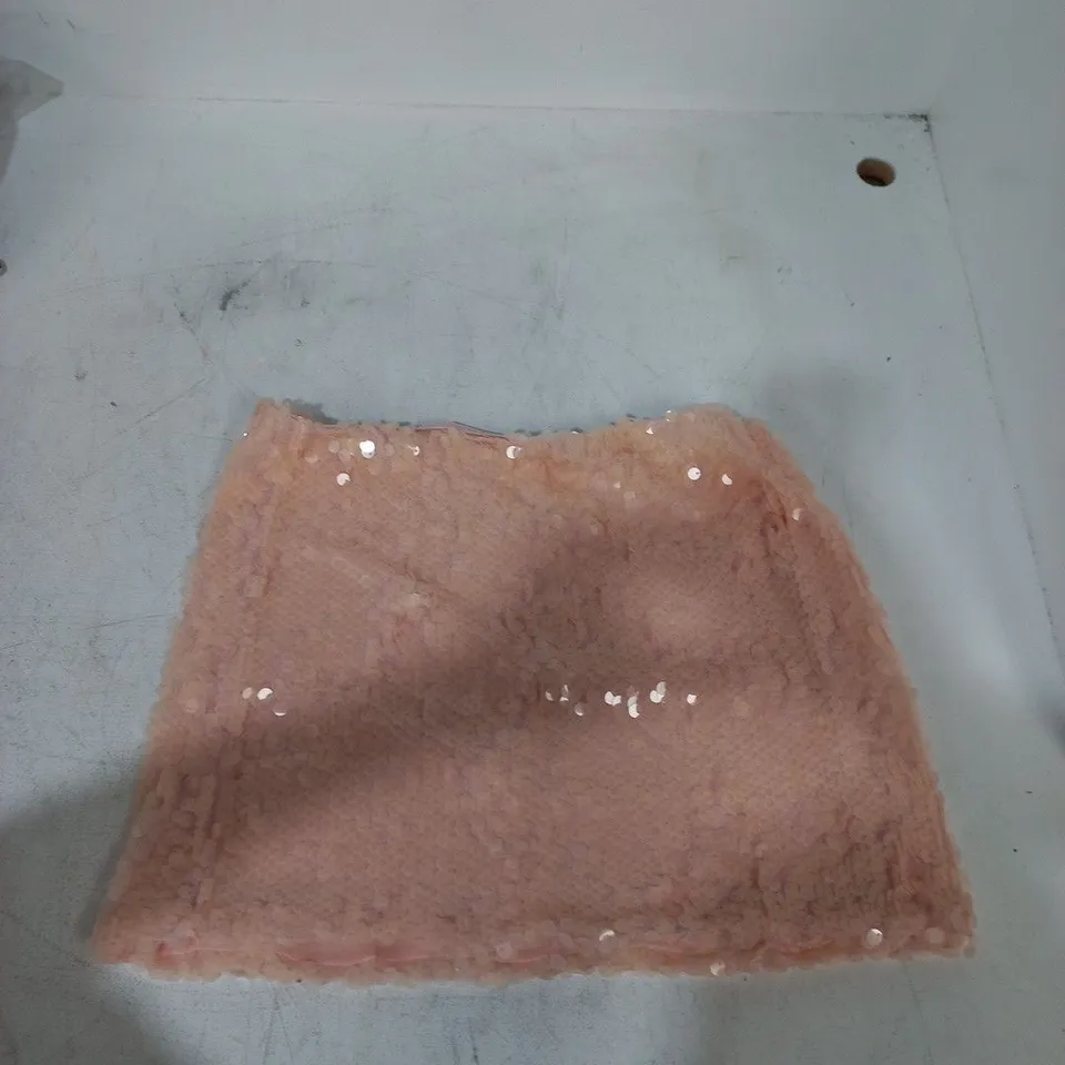 PINK SEQUIN FABRIC SKIRT.