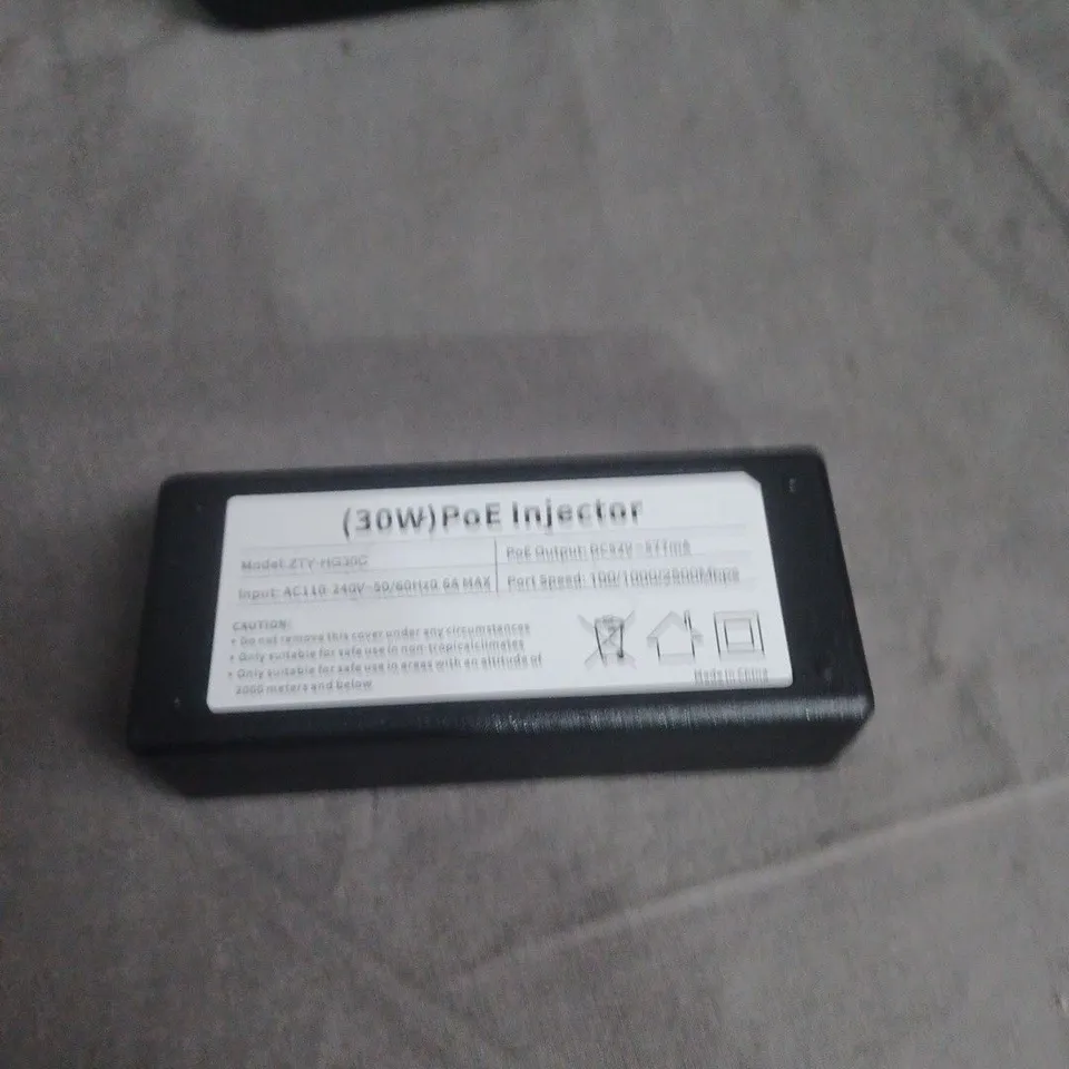 BOX OF ASSORTED ELECTRICAL ITEMS INCLUDING SKY HUB , POE INJECTOR AND POWER LEADS