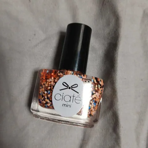 BOX OF APPROXIAMETLY 150 CIATE MINI NAIL POLISH – GLITTER CONFETTI FINISH,NO EXPIRY DATE SHOWN 