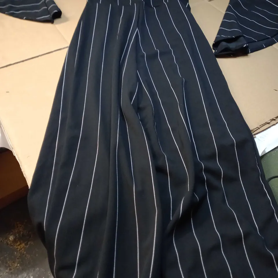 DESIGNER BLACK/WHITE STRIPED FLARED SLEEVED JUMPSUIT - SIZE 12