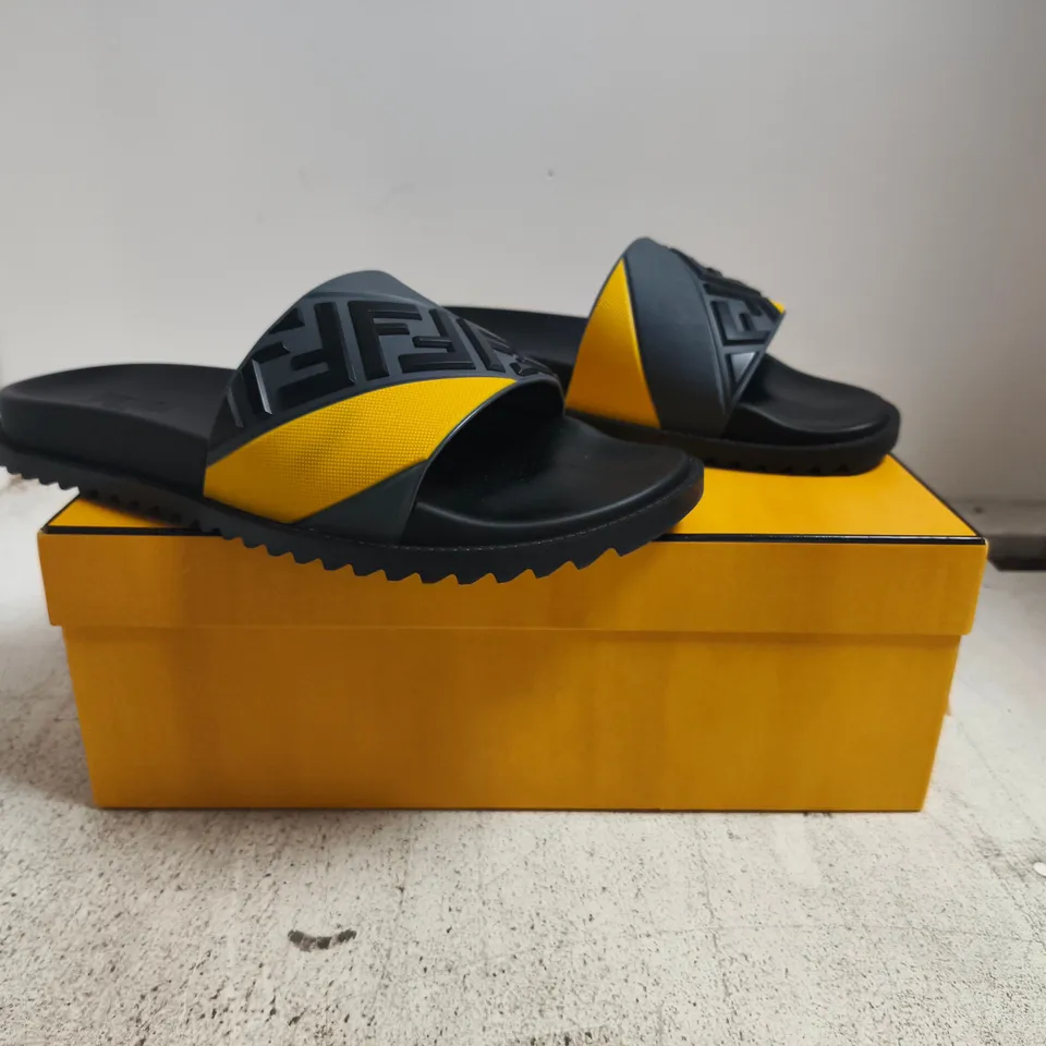 BOXED PAIR OF FENDI RUBBER SLIDES IN GREY/YELLOW SIZE 13