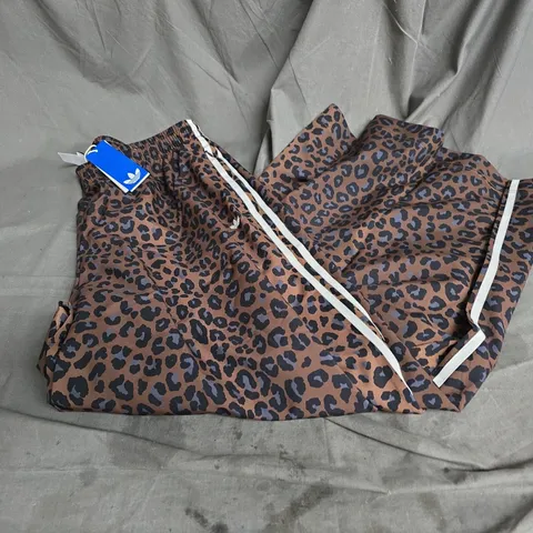ADIDAS FIREBIRD OVERSIZED TRACKSUIT BOTTOMS IN LEOPARD SIZE L