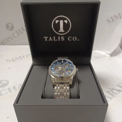 MENβS TALIS CO 7820 AUTOMATIC WATCH β BLUE SKELETON DIAL AND CASE β STAINLESS STEEL STRAP β GLASS BACKCASE