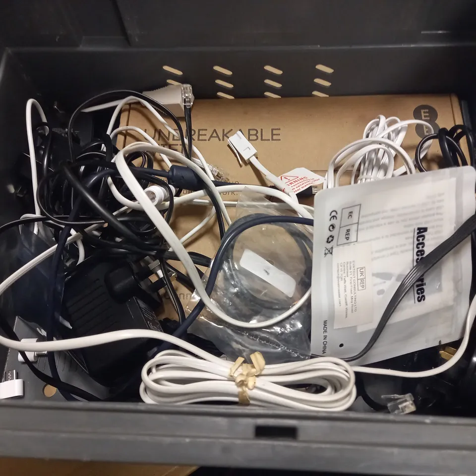 CRATE OF ASSORTED TECH ITEMS TO INCLUDE WIRELESS RECEIVER AND VARIOUS REMOTES AND CABLES