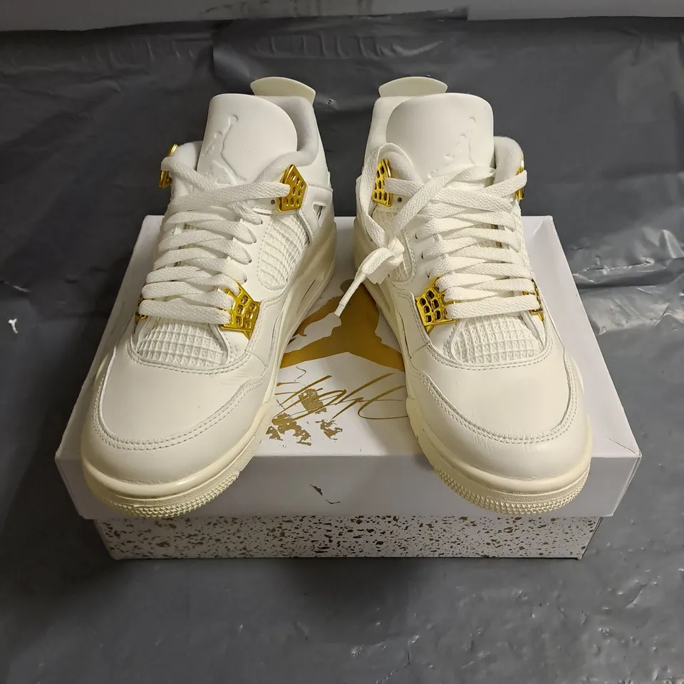 BOXED PAIR OF JORDAN 4 RETRO IN METALLIC GOLD/WHITE SIZE WOMENS UK 5.5