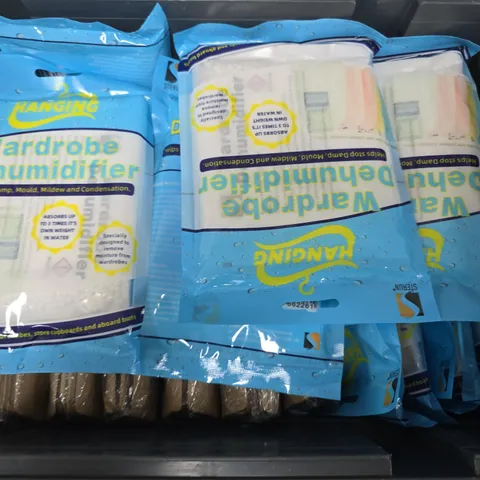 APPROXIMATELY 20 ASSORTED HOUSEHOLD ITEMS TO INCLUDE DINNER MONEY ENVELOPE PACKS, HANGING WARDROBE DEHUMIDIFIERS