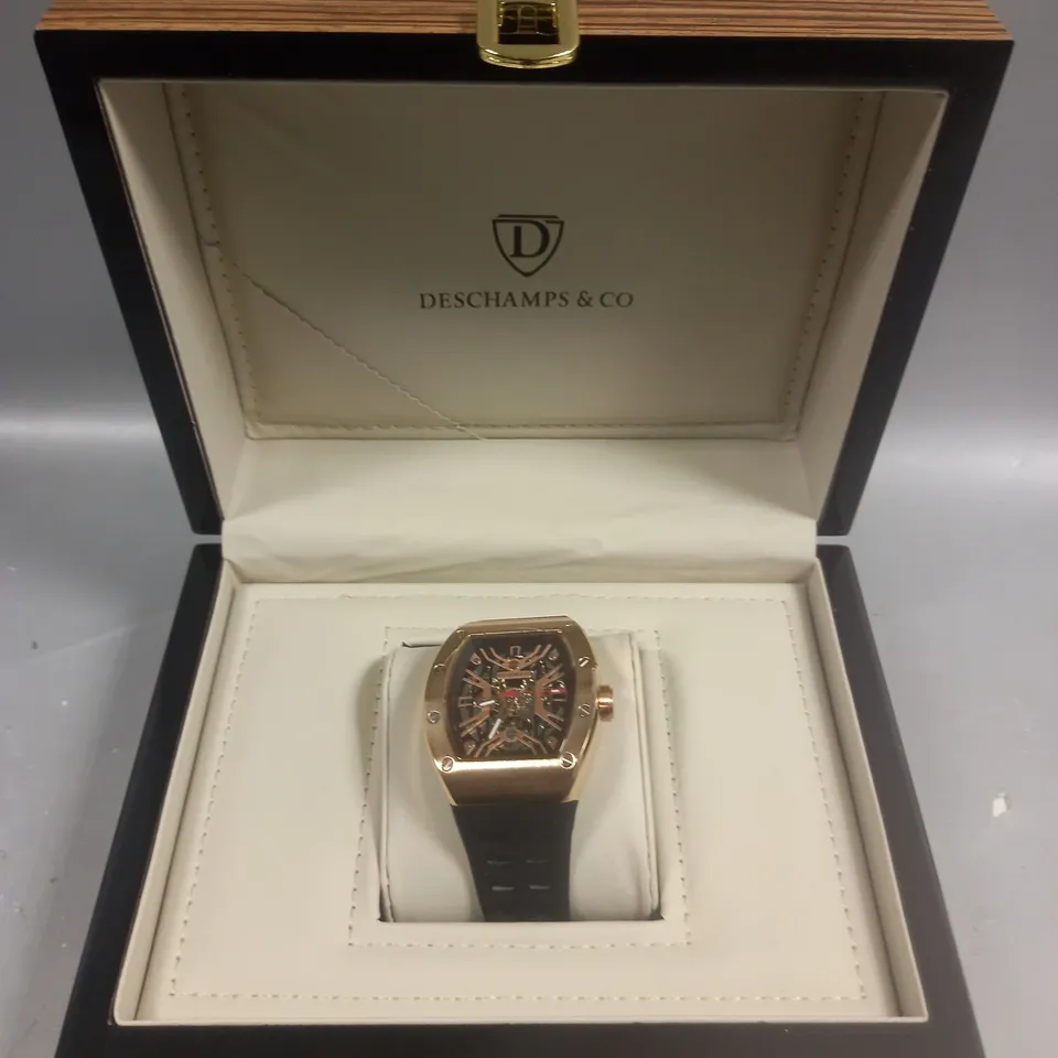DESCHAMPS & CO STAINLESS STEEL SKELETON DIAL GENTS WATCH WITH AUTOMATIC MOVEMENT AND RUBBER STRAP IN WOODEN GIFT BOX