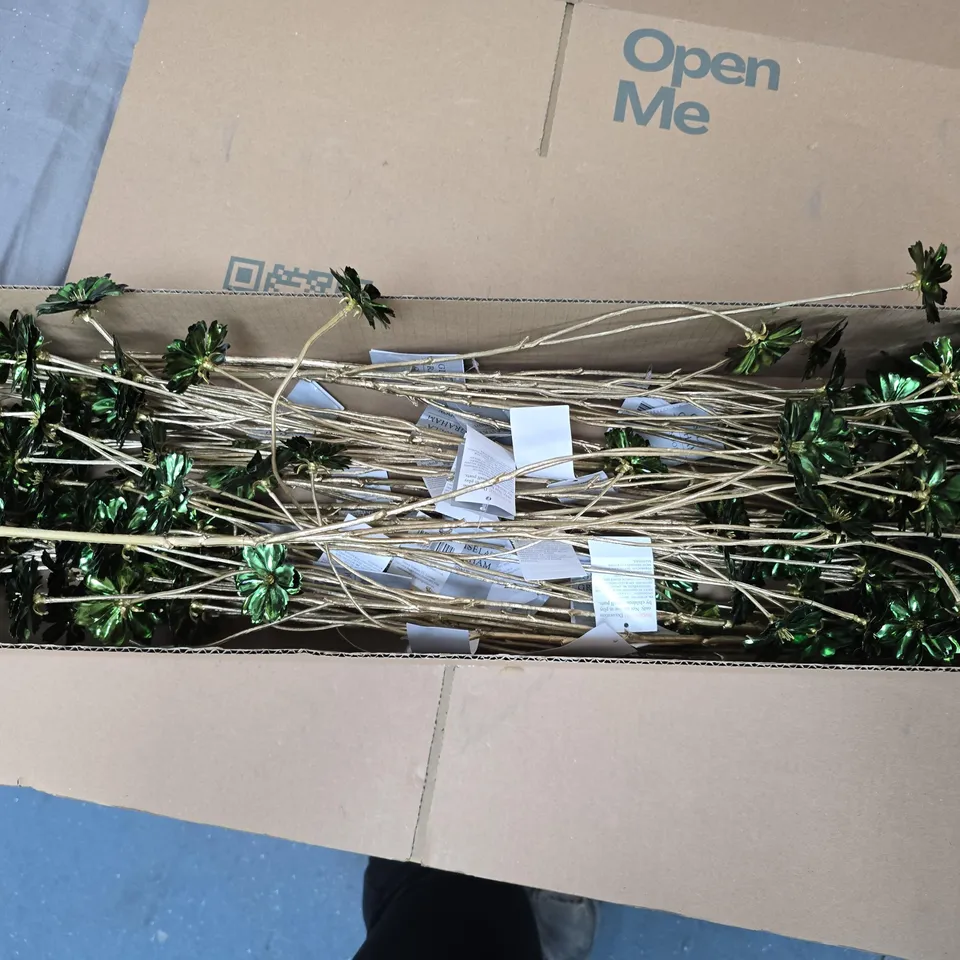 APPROXIMATELY 24 GISELA GRAHAM GREEN FLOWER ORNAMENTS