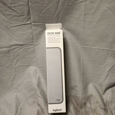 BOX OF APPROXIMATELY 25 LOGITECH DESK MATS, THE STUDIO SERIES. 