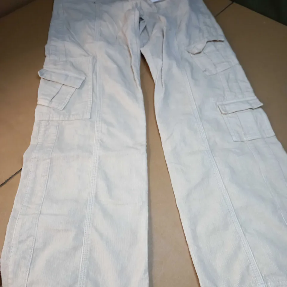 BDG URBAN OUTFITTERS CREAM LOW RISE CORD UTILITY TROUSERS - SMALL