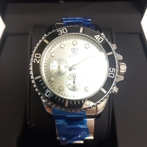 BOXED MENS RUCKSTUHL CHRONOGRAPH 8829 WATCH β STAINLESS STEEL STRAP β 3ATM WATER RESISTANT β DATE FUNCTION