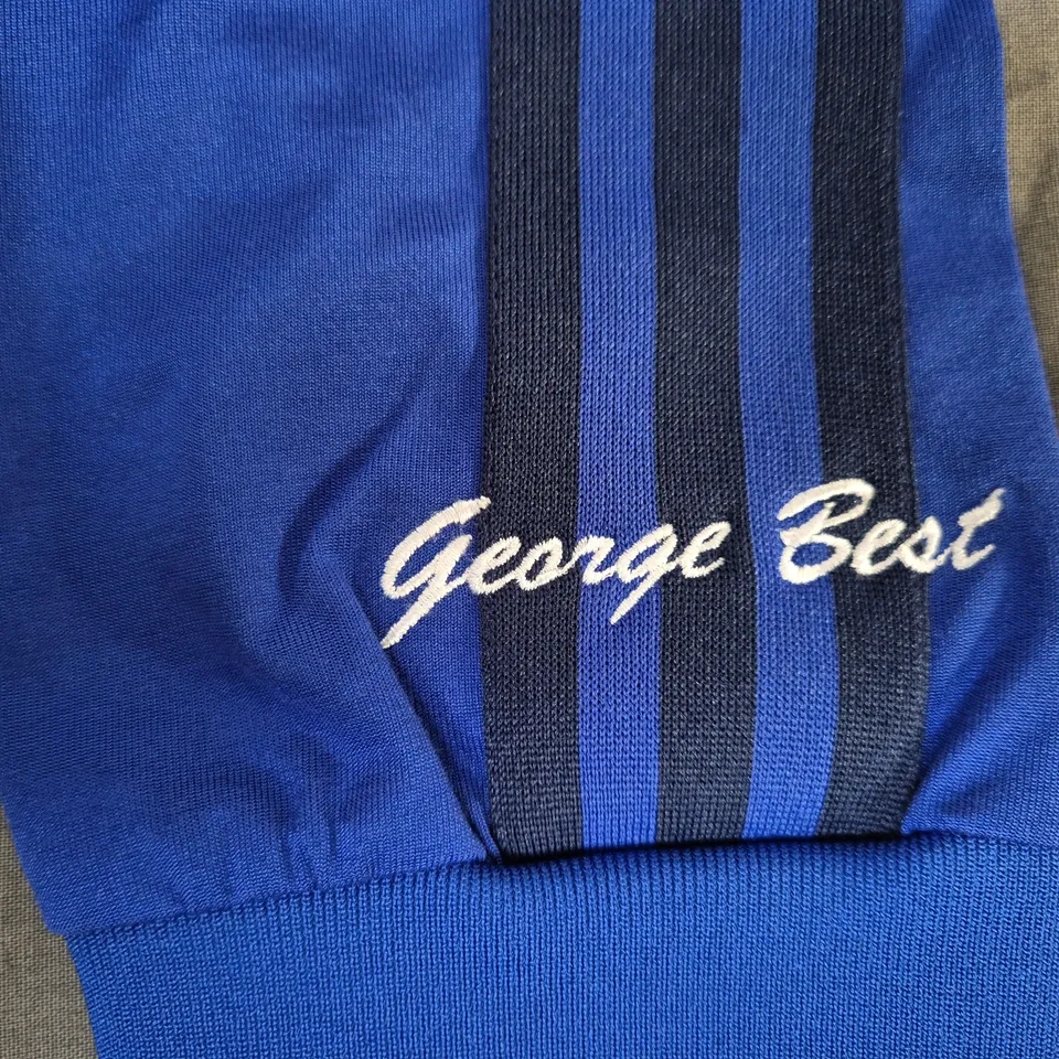 ADIDAS MANCHESTER UNITED LONG SLEEVE GEORGE BEST TOP IN BLUE SIZE SMALL