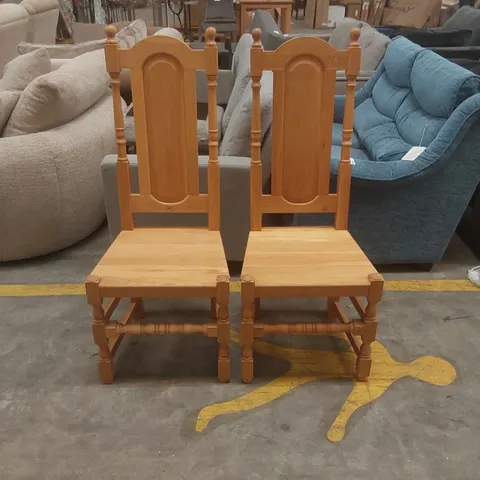 PAIR OF DESIGNER WOODEN DINING CHAIRS