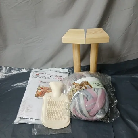 BOX OF APPROXIMATELY 15 ASSORTED HOUSEHOLD ITEMS TO INCLUDE BOOK ENDS, CROSS STITCH, MERINO WOOL YARMS, MINI HOT WATER BOTTLE ETC