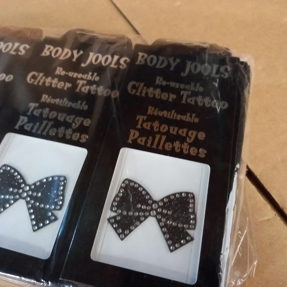 LOT OF APPROXIMATELY 95 BOW THEMED BODY JOOLS REUSABLE GLITTER TATTOOS 