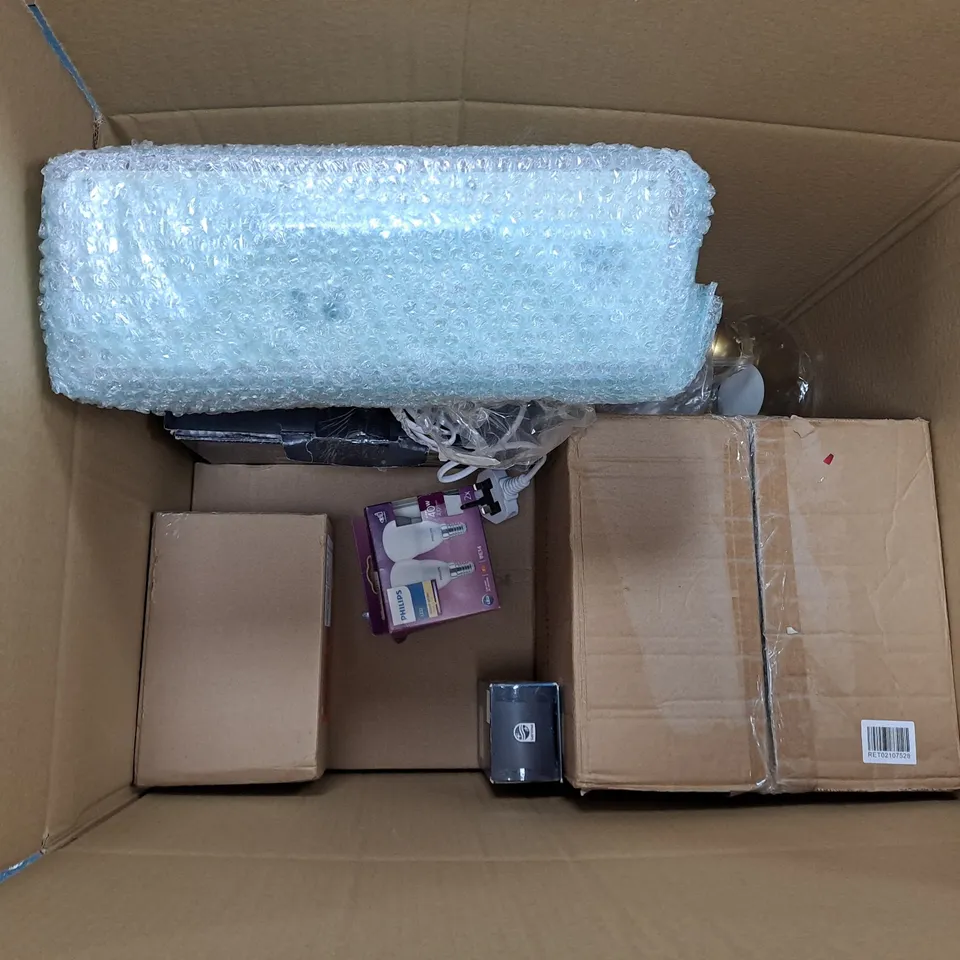 LARGE BOX OF ASSORTED ELECTRICAL ITEMS TOO INCLUDE RADIOS , LIGHT BULBS AND MOTION SENSORS 