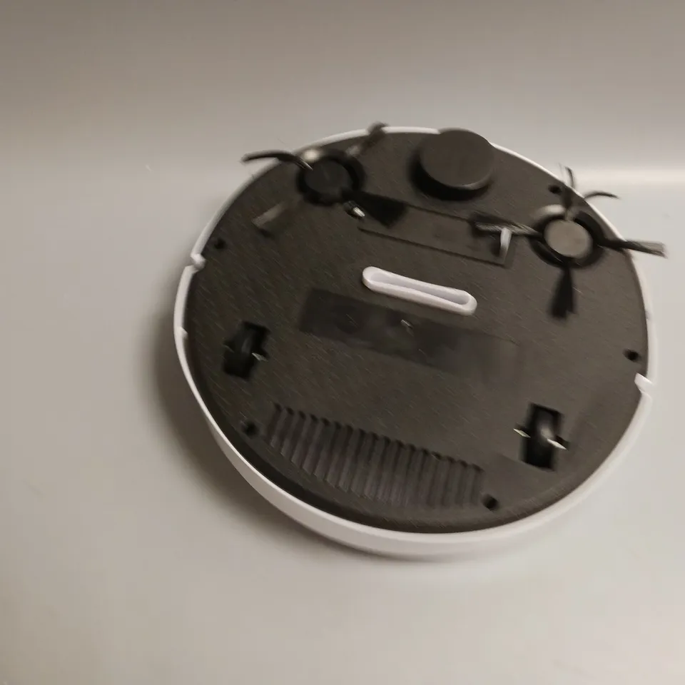 SWEEPER ROBOT IN WHITE WITH SPRAY FUNCTION AND INTELLIGENT RECOGNITION FOR VACCUMMING, WET AND DRY MOPPING AND SWEEPING INCLUDES CHARGING CABLE