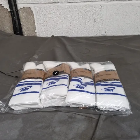 4 X NIKE 3 PACK WHITE SOCKS WITH BLUE DETAIL. MEN 8 - 12, WOMEN 10 - 13