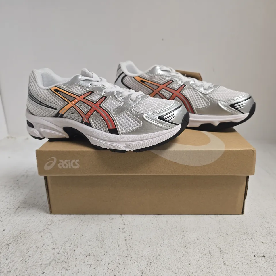 BOXED PAIR OF ASICS GEL-1130 TRAINERS IN SILVER/ORANGE SIZE UK 2