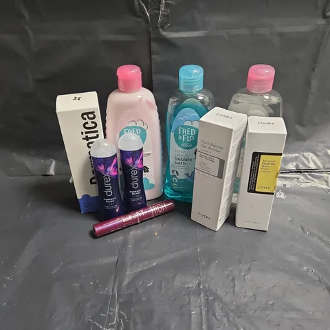 APPROXIMATEY 20 ASSORTED HEALTH AND BEAUTY PRODUCTS TO INCLUDE - FRED & FLO BABY OIL - COSRX SNAIL 96 MUCIN POWER ESSENCE - MAYBELLINE SKY HIGH MASCARA IN BURGUNDY - ETC