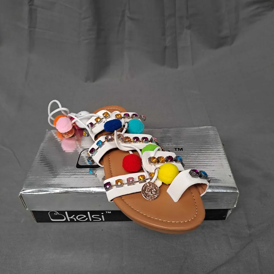 BOX OF APPROXIMATELY 8 PAIRS OF KELSI EMBELLISHED SANDALS IN WHITE - VARIOUS SIZES
