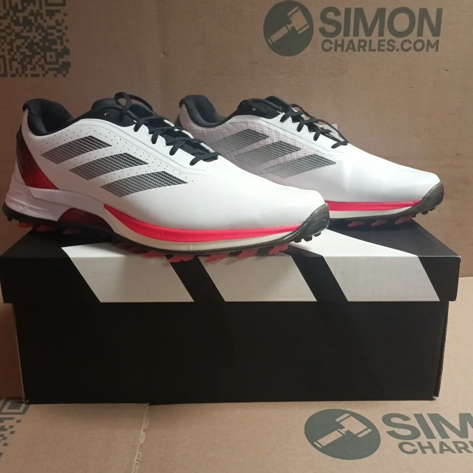 BOXED PAIR OF ADIDAS R2C TRAINERS IN WHITE/BLACK/RED SIZE UK 10