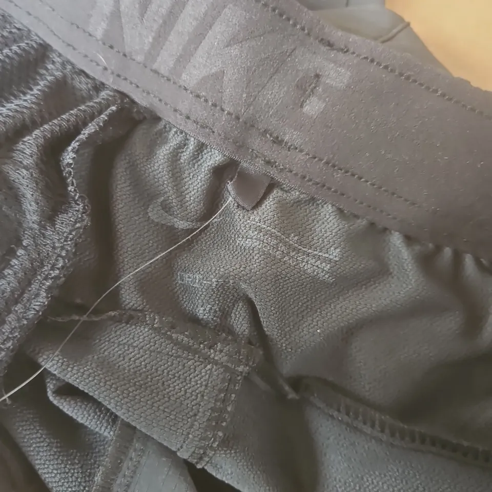 NIKE UNLIMITED TRACKSUIT BOTTOM IN BLACK - MEDIUM