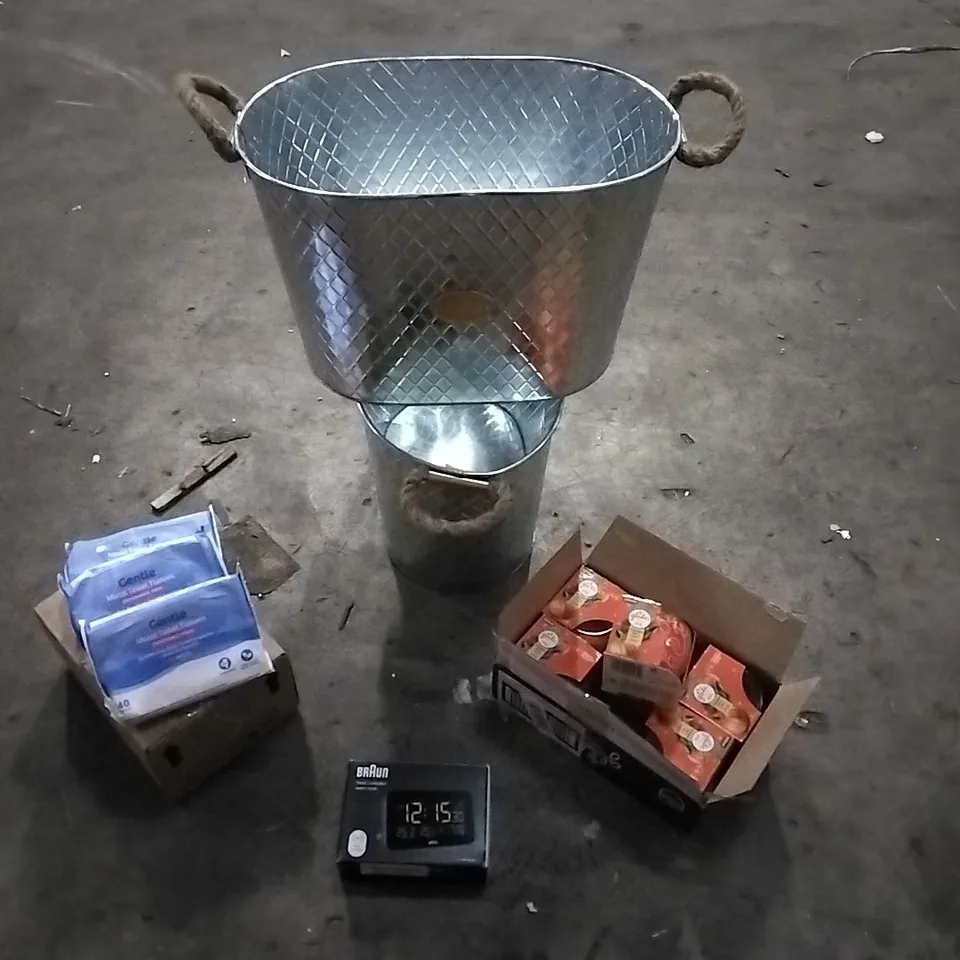 PALLET OF HOUSEHOLD ITEMS TO INCLUDE ICE BUCKETS, GENTLE MOIST TOILET TISSUES, BRAUN ALARM CLOCK,GLADE SCENTED CANDLES AND OTHER ASSORTED ITEMS...
