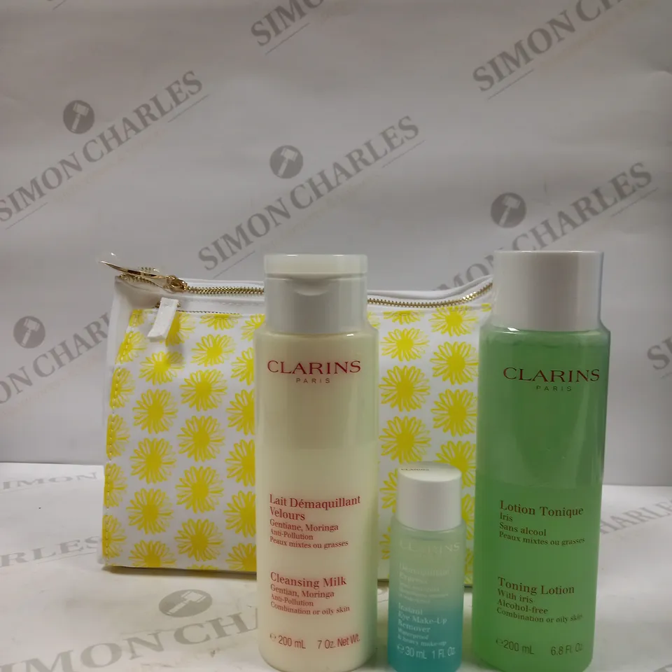 LOT OF APPROX 8 ASSORTED CLARINS PARIS SKIN CARE PRODUCTS TO INCLUDE PERFECT CLEANSING KIT, TONING LOTION, GENTLE EXFOLIATOR