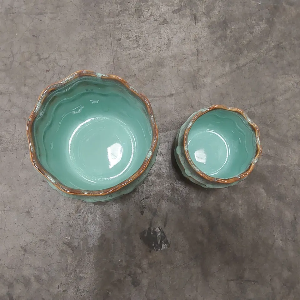 PAIR OF DESIGNER CERAMIC POTS